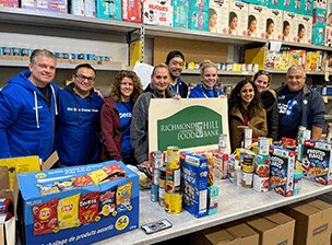 OpenText employees at a food bank