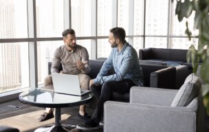 2 co-workers meeting