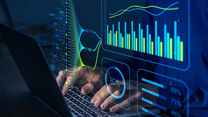 A person typing on a keyboard using AI platform services