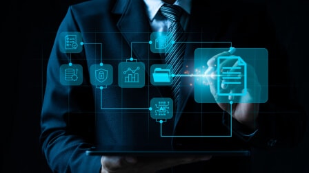 Businessman touching a glowing digital document and app icons interface