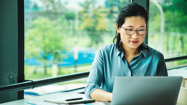 Person working on a laptop