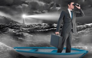 A person on a boat holding a briefcase and a binocular with a lighthouse in the background