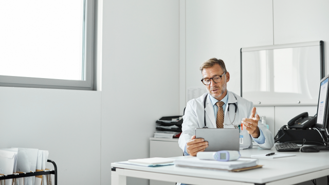 A doctor having a online conversation with a patient