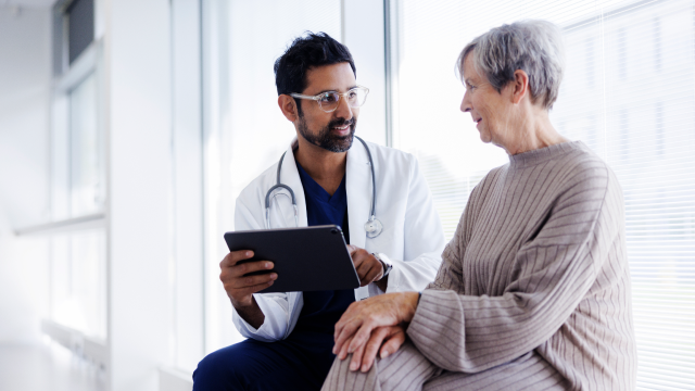 A doctor discussing reports with patient