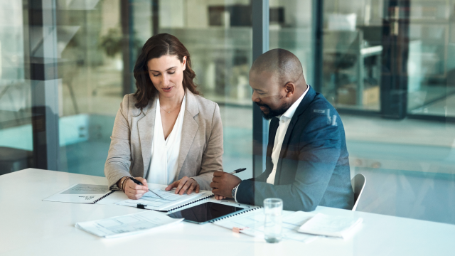 Two people discussing about project