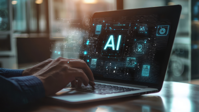 A person using AI on laptop