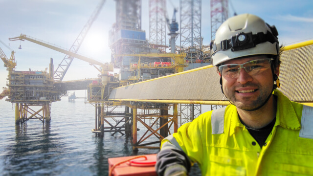 Offshore oil rig worker in safety gear