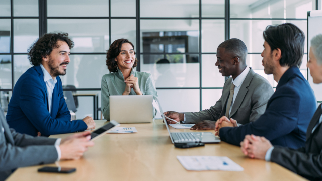 HR team meeting around a conference table