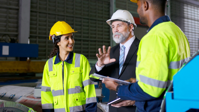 A manager showing a case study of a factory 