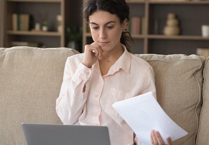 A person looking at a laptop